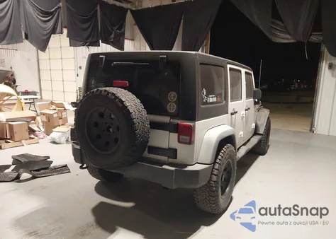 2012 Jeep Wrangler Unlimited Sport z USA, uszkodzony, nr VIN 1C4BJWDG9CL127137